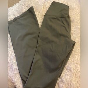 Green flared leggings